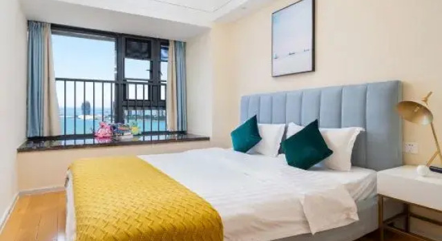 Люкс с 3 комнатами с видом на море Haitian Shengyan International Yacht Harbor Holiday Apartment