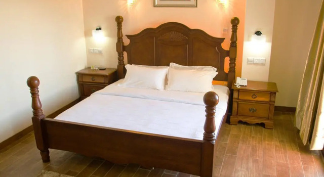 Кровать в общем номере Hotel Essencia