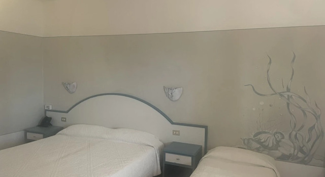 Четырёхместный номер Comfort Hotel Micalosu