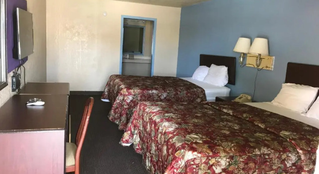 Четырёхместный номер Standard Deluxe Inn Kilgore