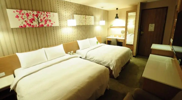 Кровать в общем номере Kindness Hotel - Jue Ming