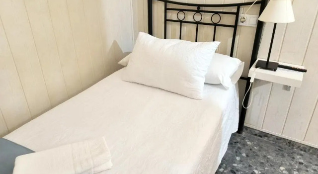 Номер Economy Pension Perez Montilla