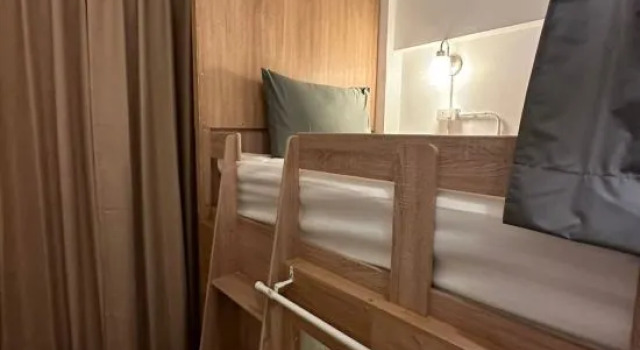 Кровать в общем номере Thai Siwilai Hostel