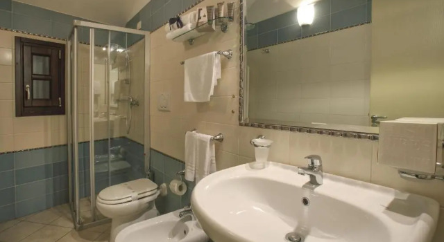Четырёхместный номер Standard Al Pescatore Hotel & Restaurant