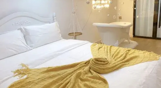 Кровать в общем номере (женский номер) Sukhothai Homestay (Shihua West Road)