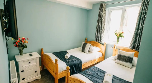 Deluxe Neljän hengen huone OYO Minerva Guesthouse