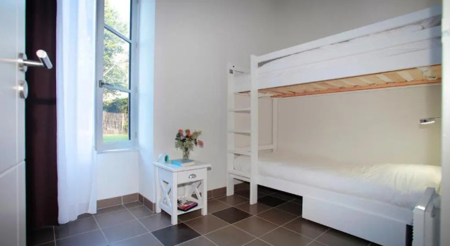 Кровать в общем номере Residenz Le Chateau De Kergonano