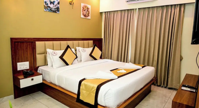 Номер Deluxe Aanvi Suites RR nagar