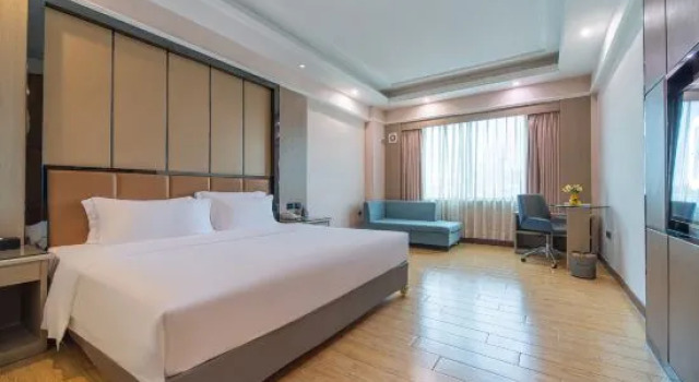 Номер Deluxe Huahai Hotel