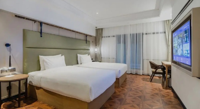 Двухместный номер Standard Manxin Hotel Qingdao Zhanqiao