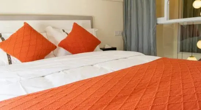 Люкс Дуплекс с 2 комнатами Yijiu Apartment (Kunming Railway Station Shuangqiao Night Market Style Street)