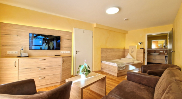 Трёхместный люкс Deluxe Tanne Tonbach - Wellness & Wohlfühl Hotel
