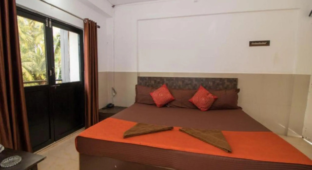 Номер Deluxe Goroomgo Travellers Inn Goa