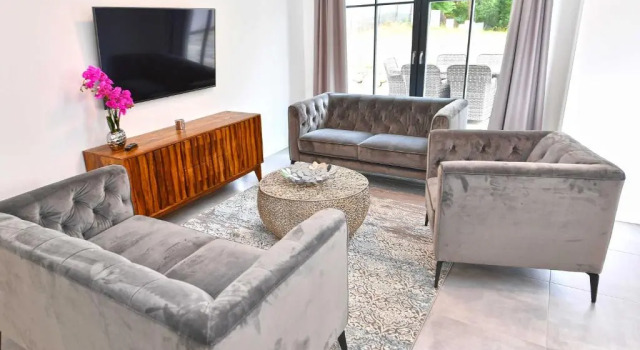 Villa LEVANTE in Binz - Gartenwohnung mit Kamin, Sauna, Terrasse, Забронировать Вилла Виллы Остзебад-Бинц, рядом с Binz Station, Вилла
