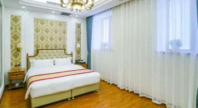 Кровать в общем номере Modern M Hotel