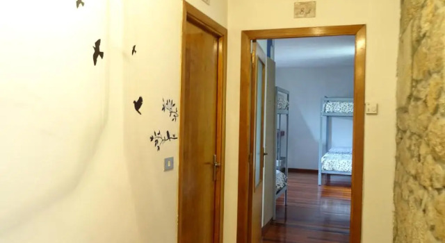 Кровать в общем номере Albergue Convento Del Camino