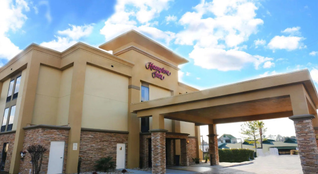 Кровать в общем номере Hampton Inn Sumter