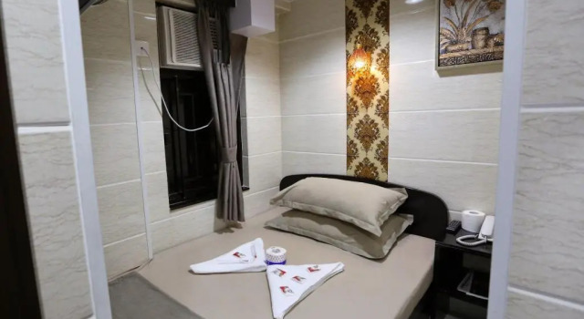Merryland Guest house, Boek Pension Tsim Sha Tsui Hongkong, in de buurt van The ONE