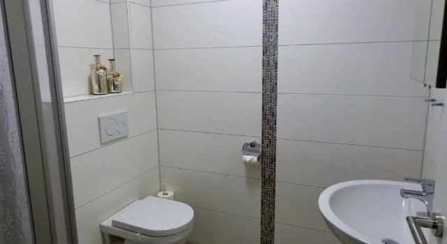 Апартаменты Ostfrieslands Perle Ferienwohnung an der Nordseeküste, Sauna, Terrasse, Garten, ruhige Lage, WLAN