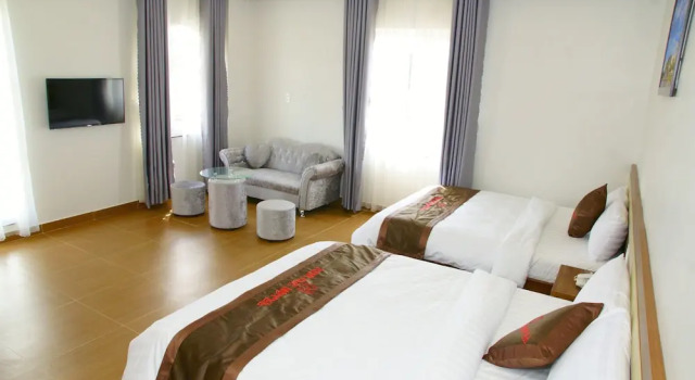 Четырёхместный номер Executive Anh Duc Hotel Da Lat