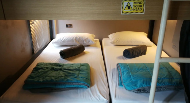 Кровать в общем номере Hubb Hostel Phuket Airport