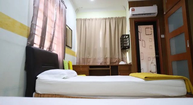 Номер Standard с 4 комнатами OYO Homes 90575 C.k Bahau Homestay
