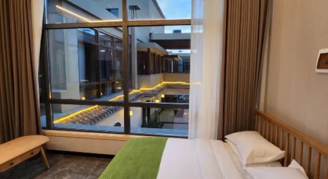 Двухместный семейный люкс с видом на внутренний двор Yunduan Youyuan·Hotel (Liupanshui Wanda Plaza)
