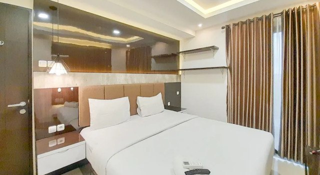 Апартаменты Spacious And Elegant 1Br At Patraland Amarta Apartment