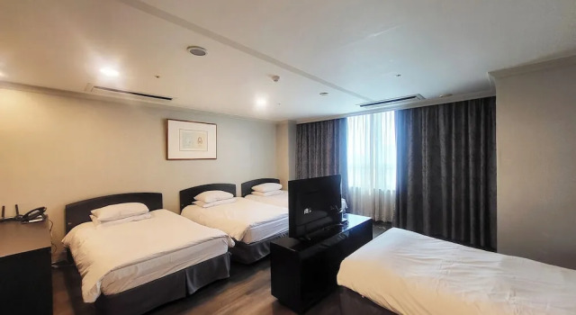 Четырёхместный номер Premier Ramada Hotel and Suites Seoul Namdaemun