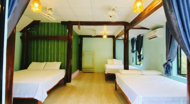 Кровать в общем номере Jungle Boss Homestay