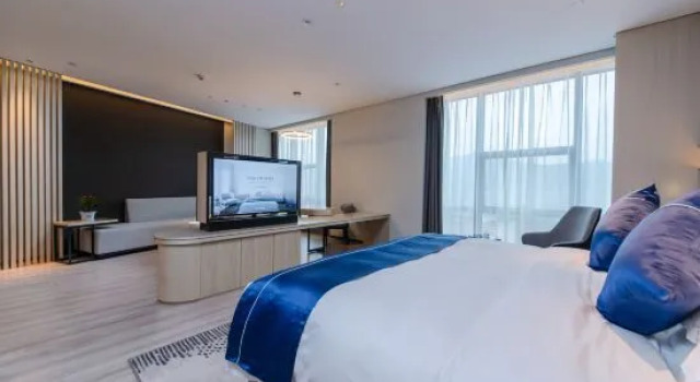 Люкс Deluxe Wanxiang Hotel (huaihua guojishangmaocheng guomaodian)
