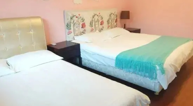 Suite 1 sypialnia Tianrun International Hotel