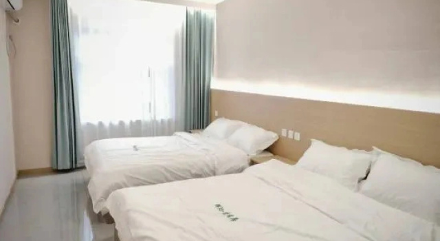 Кровать в общем номере Huiyang Yingliju Homestay