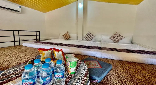 Кровать в общем номере Sapa Village Hotel
