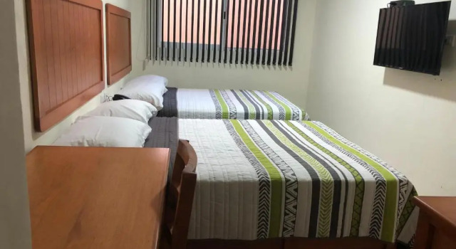 Четырёхместный номер Deluxe Hotel Pastora