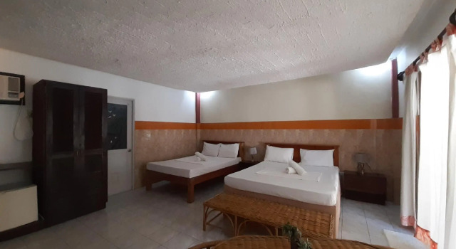 Cooper's Beach Resort, Rezerwuj Ośrodek wypoczynkowy Arrecife Island Filipiny