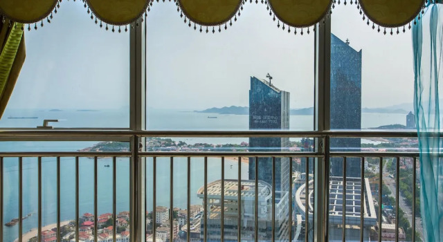 Апартаменты с 4 комнатами с видом на море Qingdao Jinshan We Holiday Apt Wusi