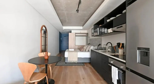 Апартаменты Station House Studio Apartment Gym Rooftop Pool