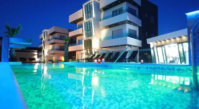 Апартаменты Deluxe с 2 комнатами с балконом и с видом на бассейн Boutique Apartments Ad Astra