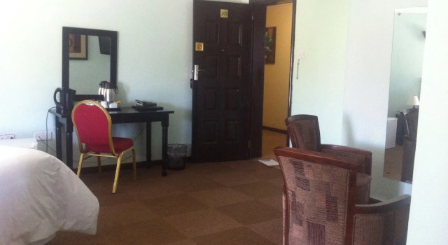 Camera familiare Standard con vista sul giardino Exec Closets Hotel