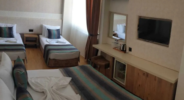 Трёхместный семейный номер Standard Grand Boss Suit Hotel