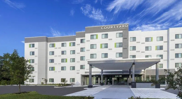 Кровать в общем номере Courtyard by Marriott Tampa Northwest/Veterans Expressway