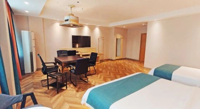Трёхместный люкс Deluxe Xinjiayuan Hotel