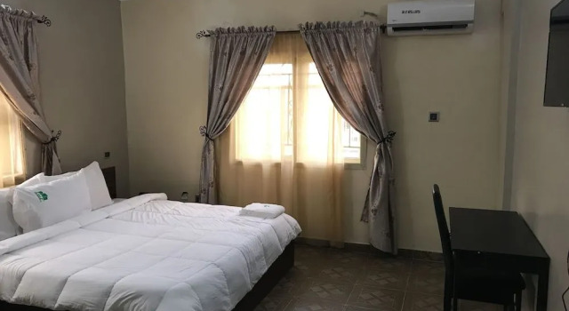 Unifirst hotel & suites