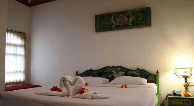 Номер Deluxe Puri Bunga Beach Cottages