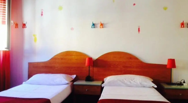 Кровать в общем номере Hotel Galla