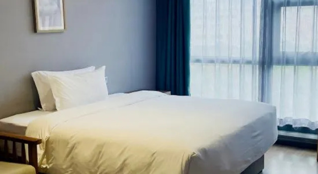 Семейный люкс MEHOOD LESTIE Hotel (Weiyang road Qing Shao Nian Zhong Xin Station)