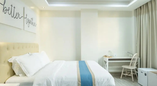 Номер Deluxe Hampton Suites