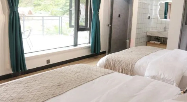 Кровать в общем номере Xiaoyang Tongue Homestay