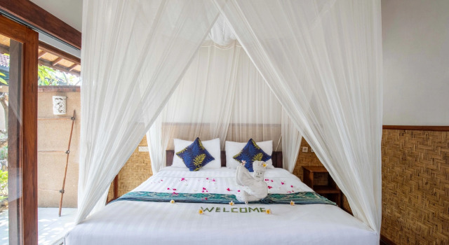 Номер Deluxe Made Taro - Menjangan Homestay